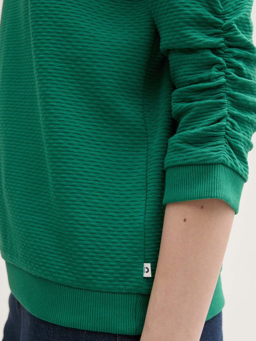 sudadera con volantes
