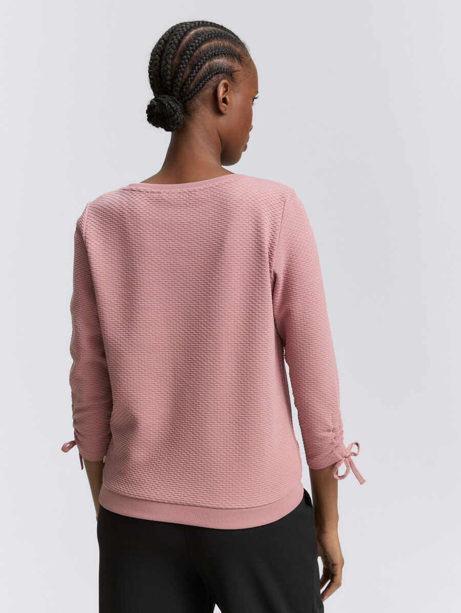sudadera con mangas fruncidas