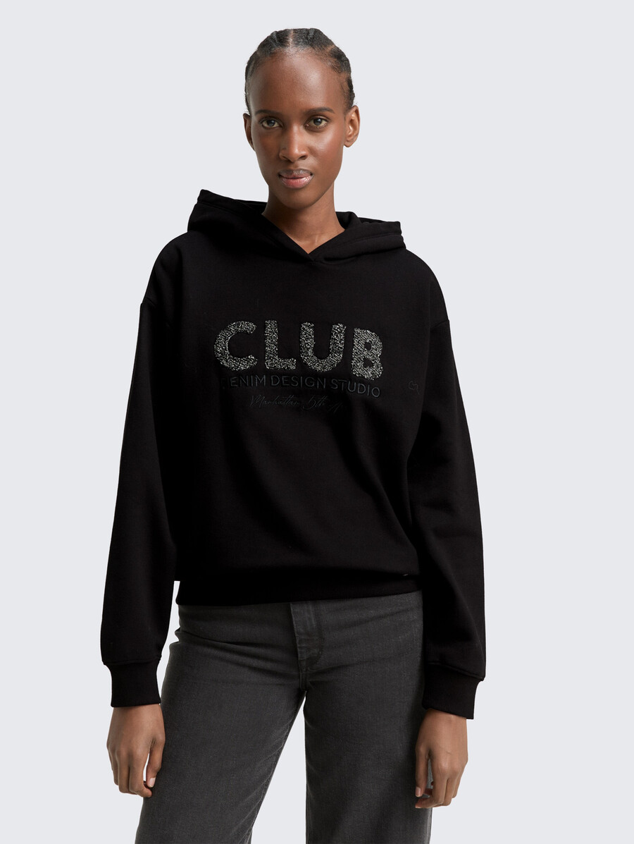 sudadera con capucha de gran tamaño y apliques de purpurina