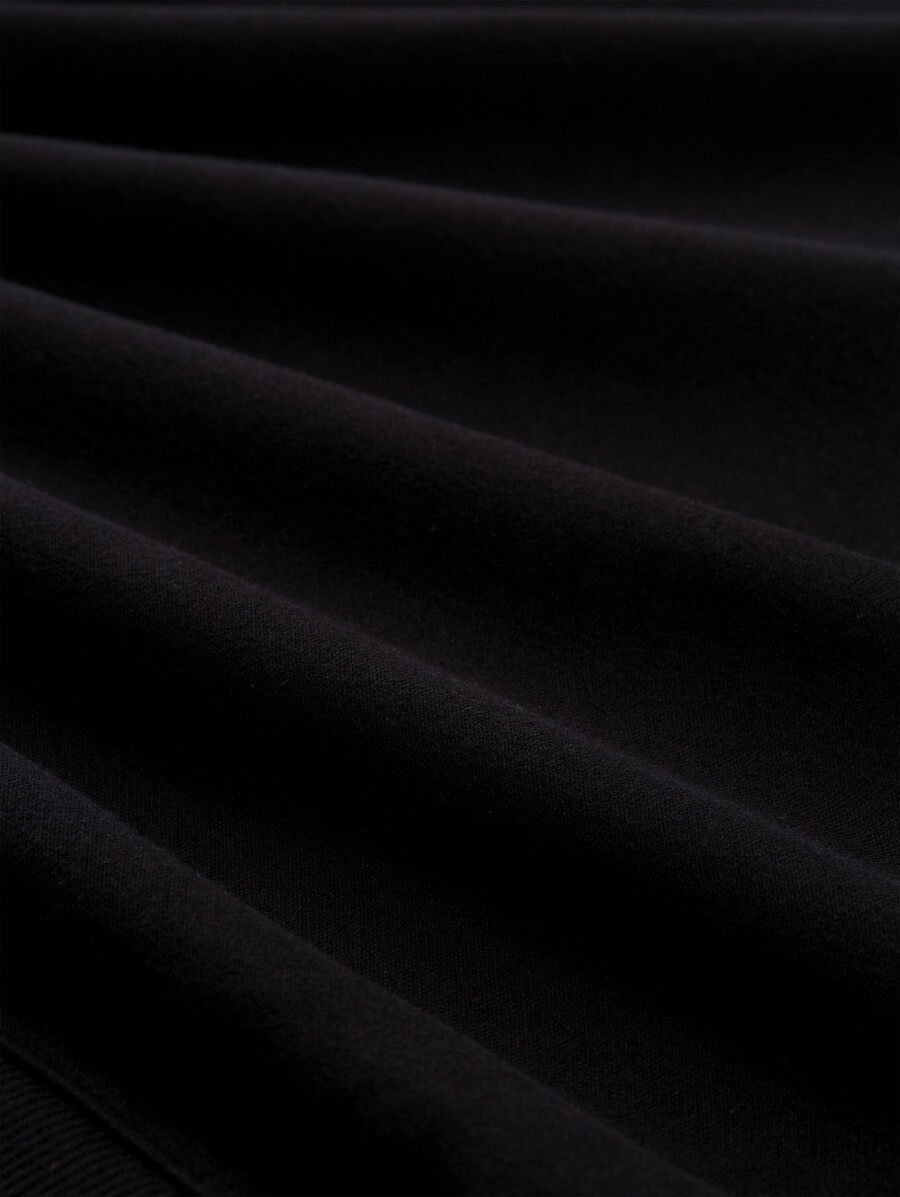 sudadera con capucha de gran tamaño y apliques de purpurina
