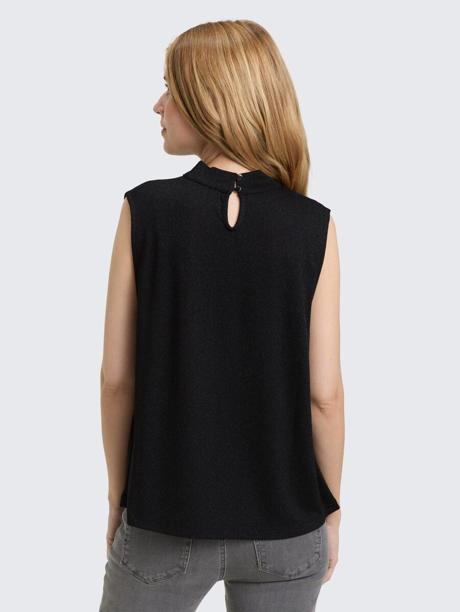 top con efecto brillo